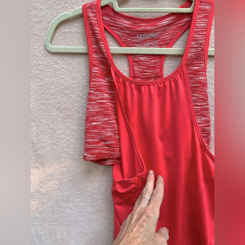 Running Room Women’s loose tank with built in bra. Size M